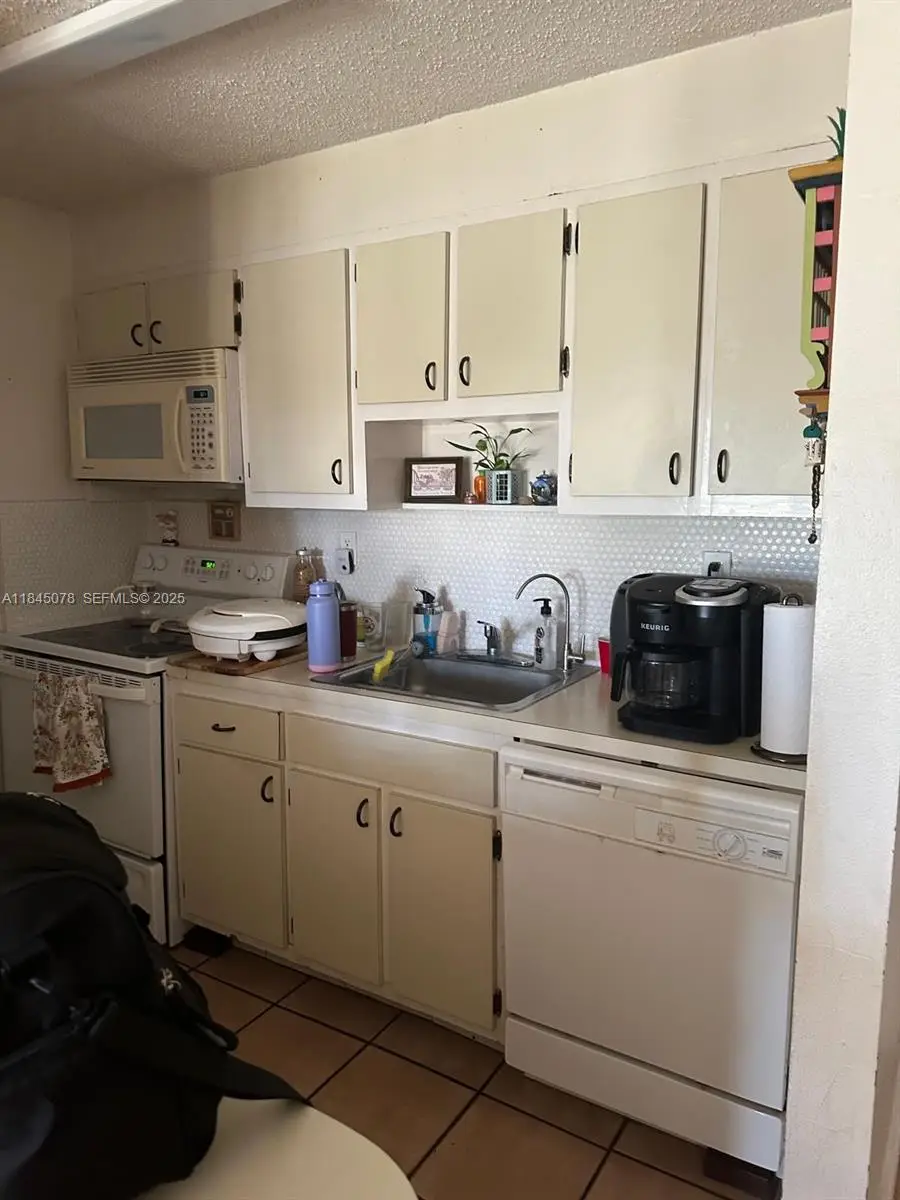 309 S Royal Poinciana Boulevard #302, Miami Springs, FL 33166 - #2