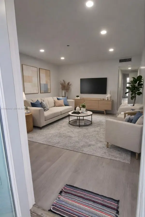 455 Golden Isles Drive #310, Hallandale Beach, FL 33009