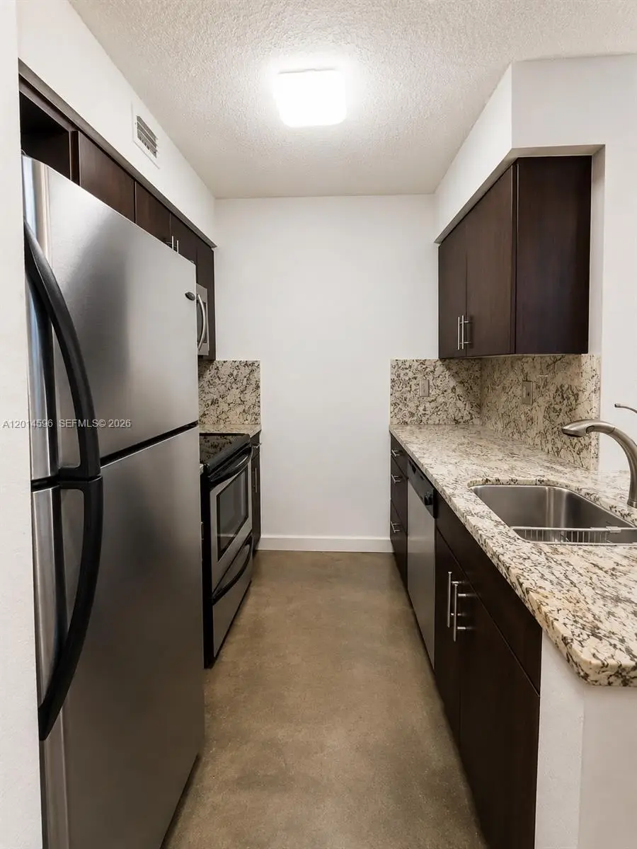 2890 N Oakland Forest Drive #203, Oakland Park, FL 33309 - #3