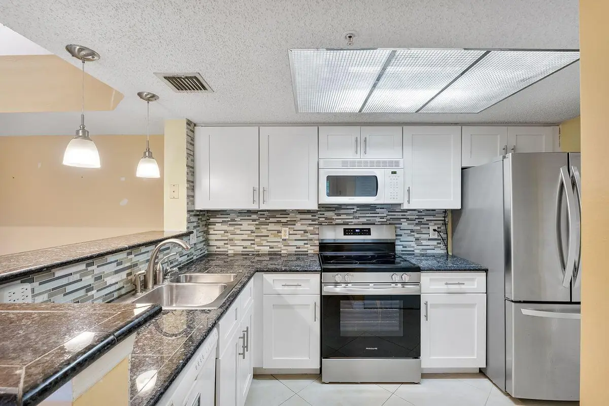 5011 Wiles Road #Unit 303, Coconut Creek, FL 33073 - #1