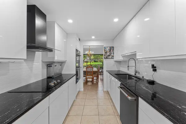 6864 Willow Wood Drive #405, Boca Raton, FL 33434