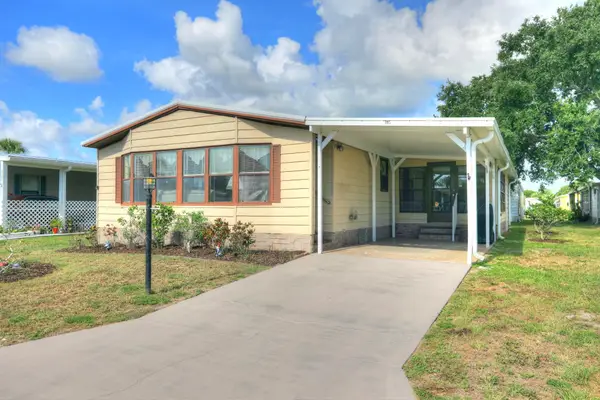705 Hyacinth Circle, Barefoot Bay, FL 32976