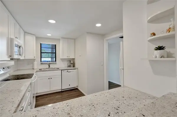 2410 Deer Creek Country Club Boulevard #202, Deerfield Beach, FL 33442