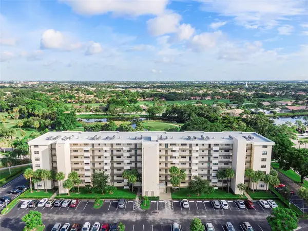 2400 Deer Creek Country Club Blvd #202, Deerfield Beach, FL 33442