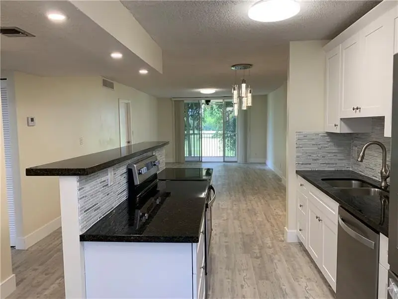 250 Jacaranda Drive #203, Plantation, FL 33324 - #1