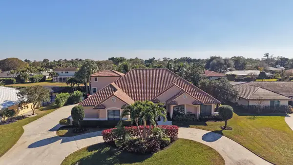 513 N Country Club Drive, Atlantis, FL 33462