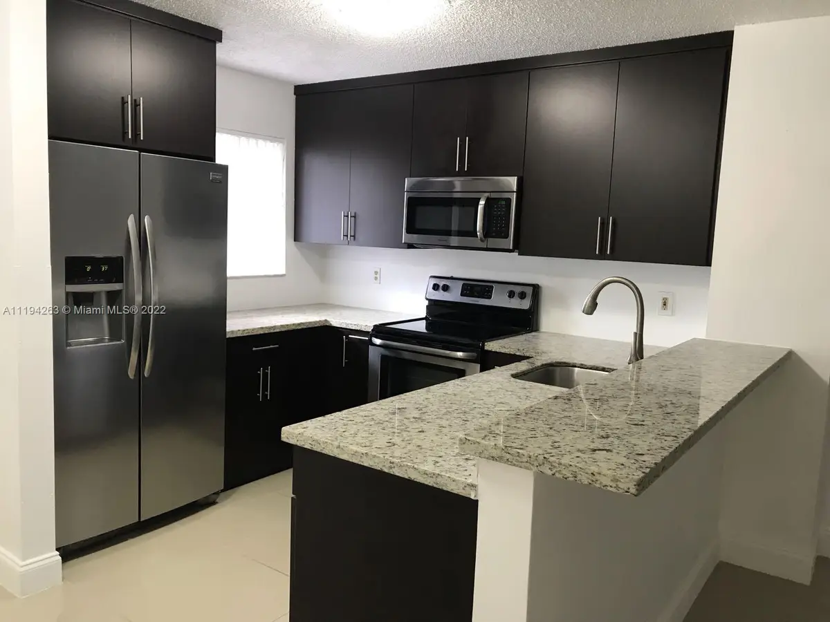 8730 N Sherman Cir #302, Miramar, FL 33025 - #1