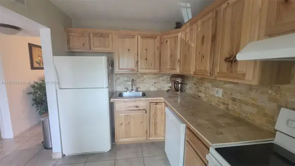 5851 NW 62nd Ave #202, Tamarac, FL 33319