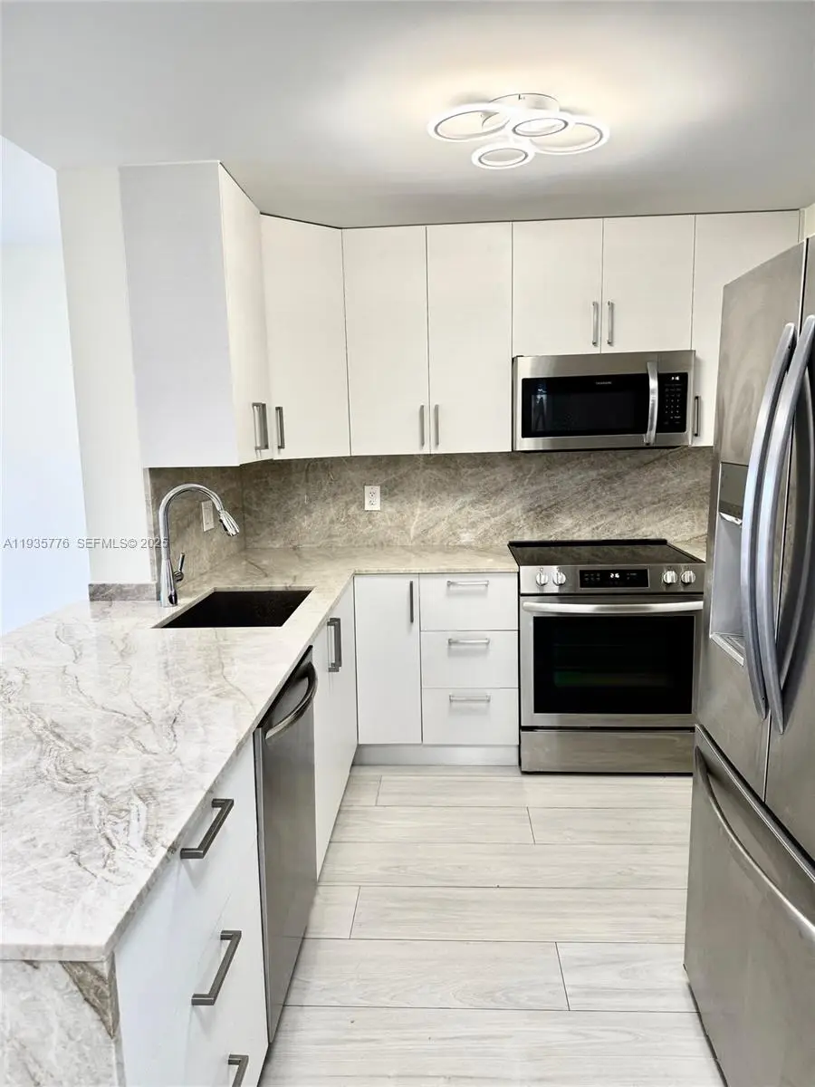 401 Golden Isles Dr #701, Hallandale Beach, FL 33009 - Image #1