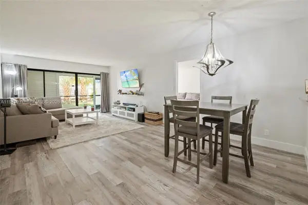 301 Racquet Club Rd #104, Weston, FL 33326