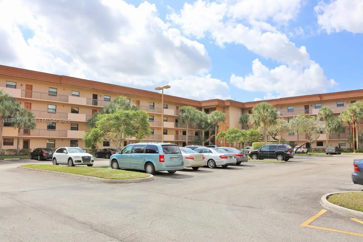 4940 E Sabal Palm Blvd #203, Tamarac, FL 33321 - Image #1