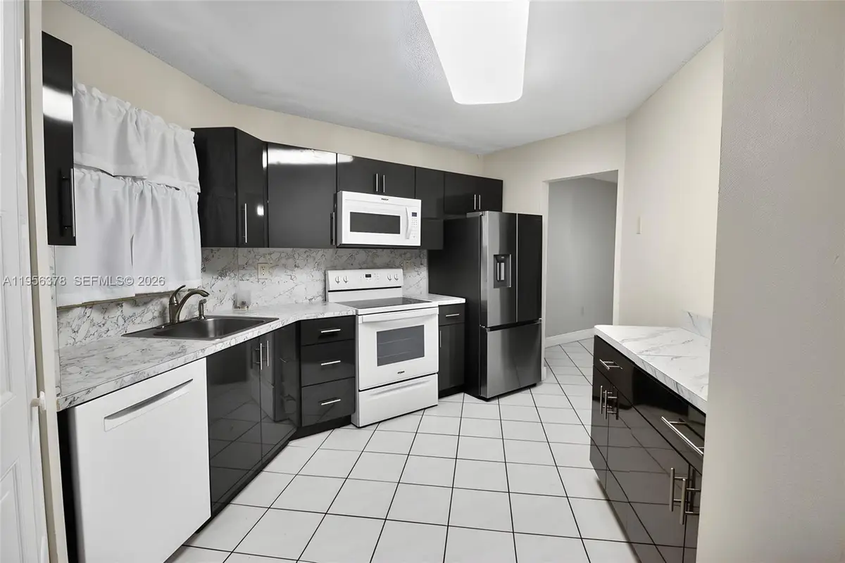 6555 W Broward Blvd #303, Plantation, FL 33317 - Image #1