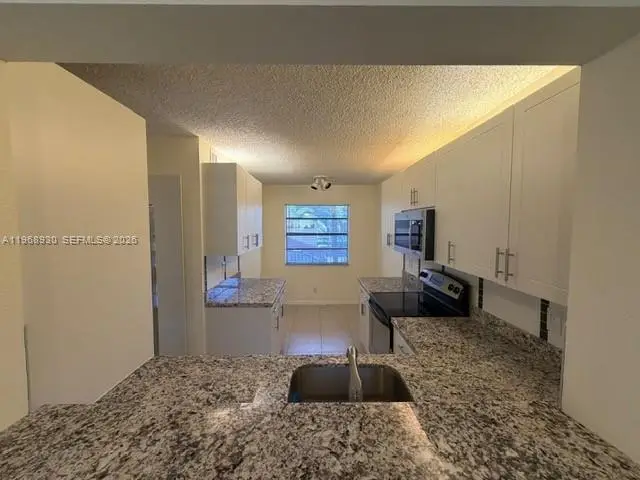 2071 Coral Ridge Dr #N204, Coral Springs, FL 33071 - #3