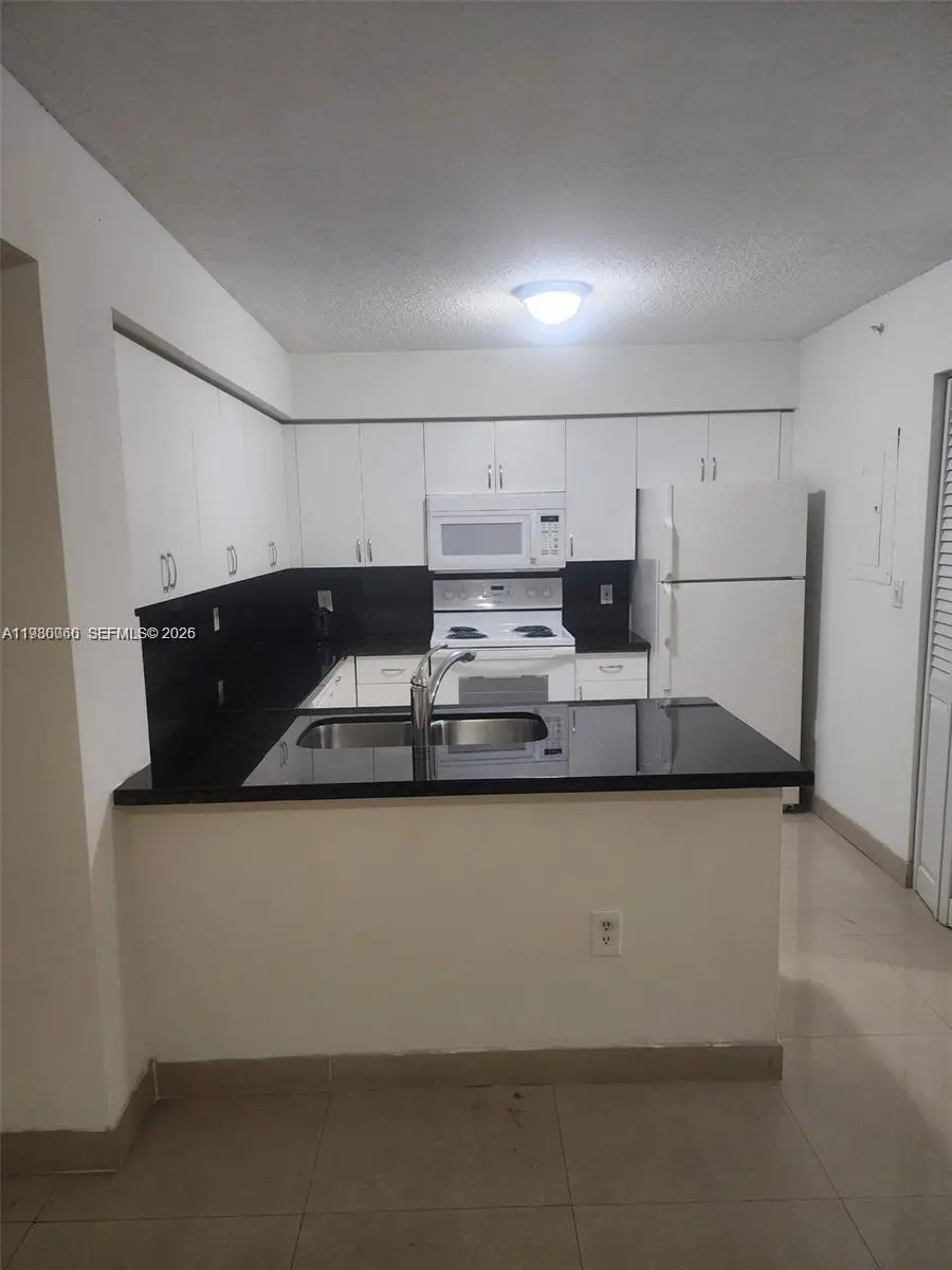 4560 NW 107th Ave #207-12, Doral, FL 33178 - #1