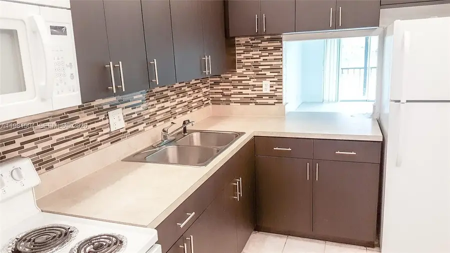 7911 N Colony Cir N #202, Tamarac, FL 33321 - #2