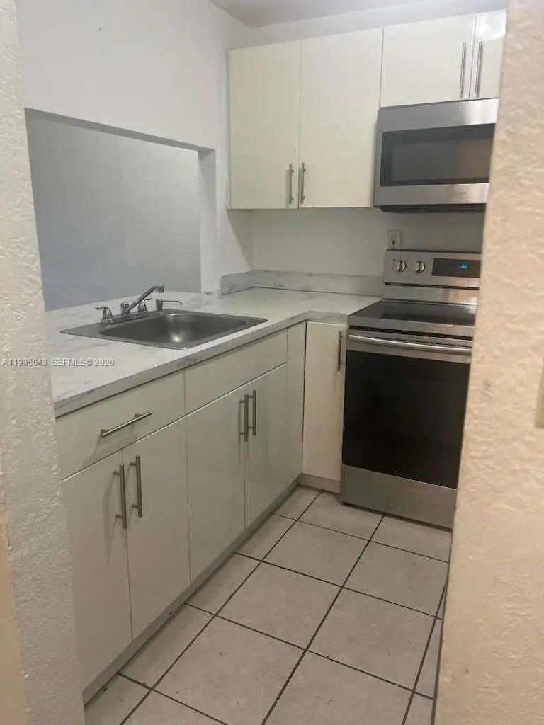 4550 NW 9th St #114E, Miami, FL 33126 - #2