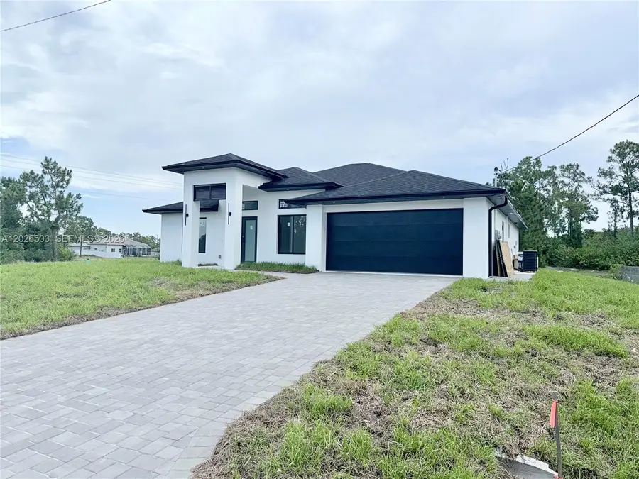 705 Colyer St E, Lehigh Acres, FL 33974 - #2