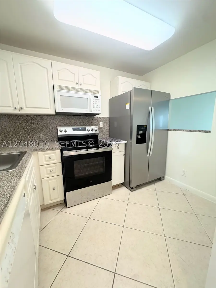 9660 Sunrise Lakes Blvd #202, Sunrise, FL 33322 - #2