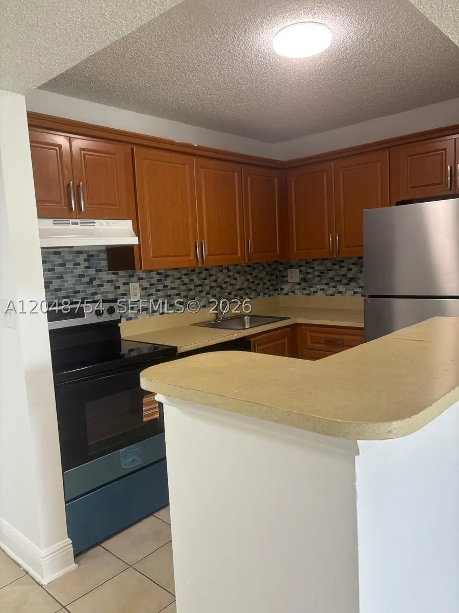 7110 NW 179th St #211, Hialeah, FL 33015 - #2