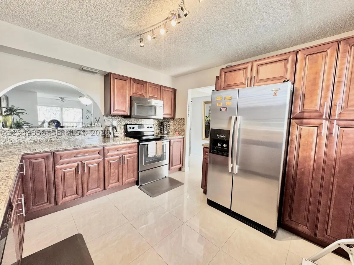 4975 E Sabal Palm Blvd #311, Tamarac, FL 33319 - #1