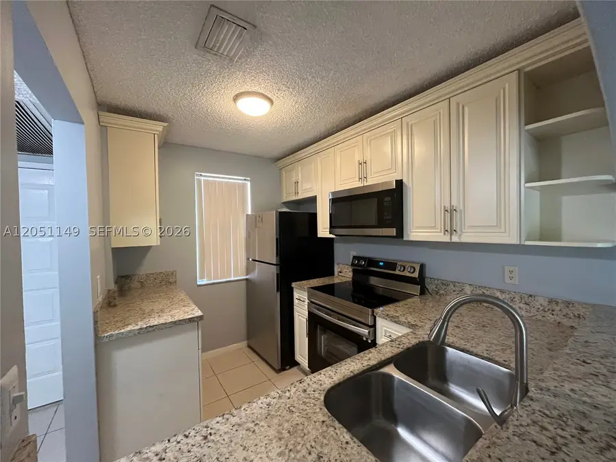 2740 Forest Hills Blvd #202, Coral Springs, FL 33065 - #3