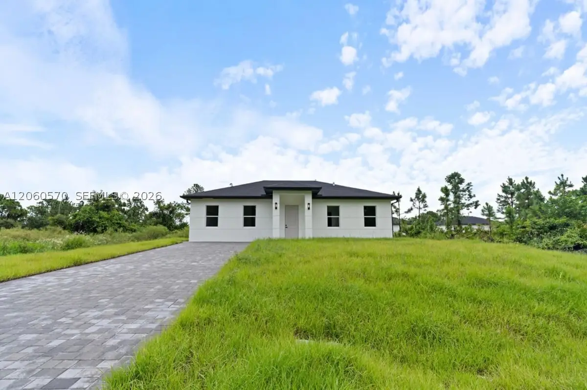 708 Peacock Ave, Lehigh Acres, FL 33974 - #1