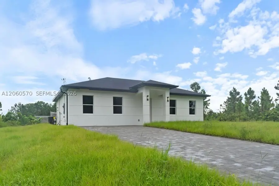 708 Peacock Ave, Lehigh Acres, FL 33974 - #2