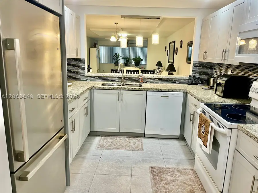2901 N Nob Hill Rd #107, Sunrise, FL 33322 - #2