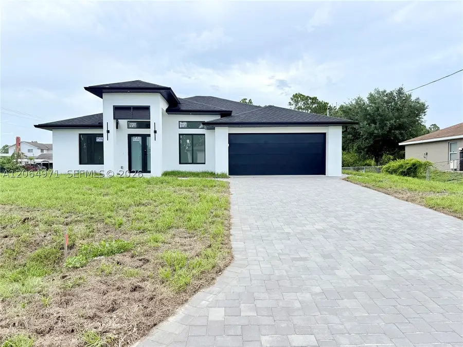 705 Colyer St E, Lehigh Acres, FL 33974 - #2