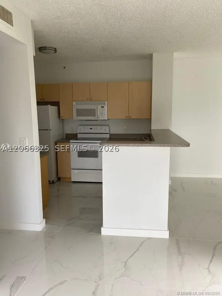 7980 N Nob Hill Rd #102, Tamarac, FL 33321 - #2