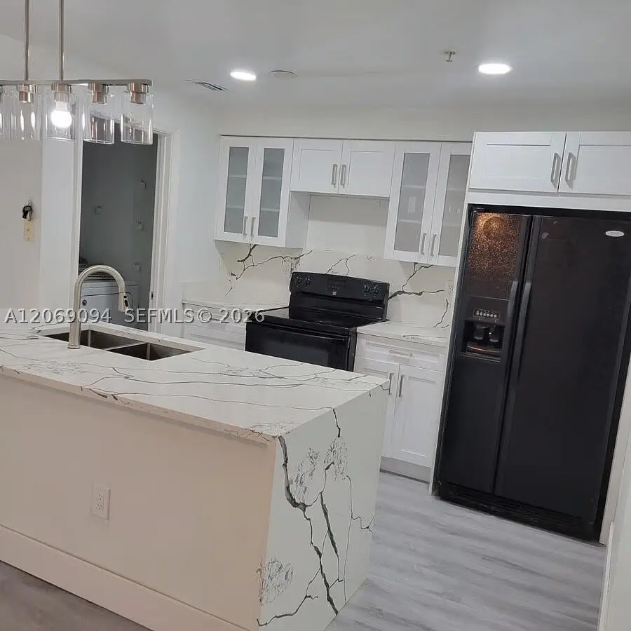5840 W Sample Rd #302, Coral Springs, FL 33067 - #2