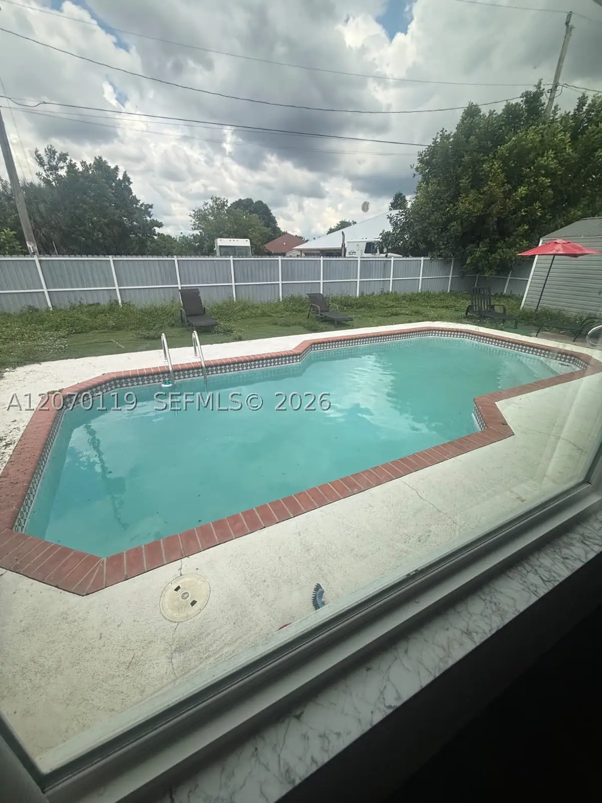 129 E Lake Dr, Lehigh Acres, FL 33936 - #1