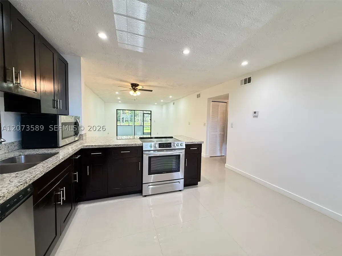 6095 N Sabal Palm Blvd #103, Tamarac, FL 33319 - #1