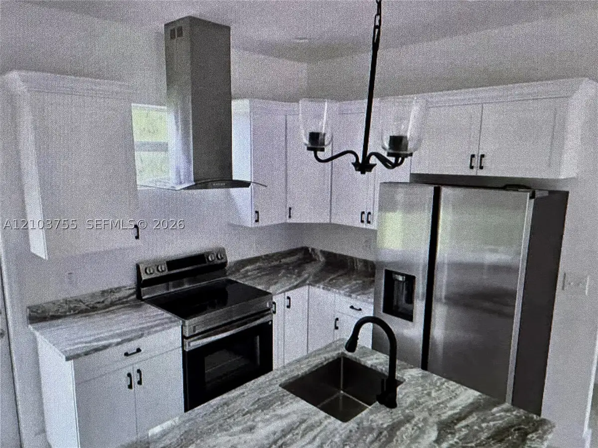 2906 W 52 St, Lehigh Acres, FL 33971 - #1