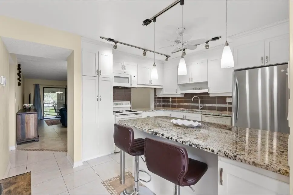 6095 N Sabal Palm Boulevard #210, Tamarac, FL 33319 - #1