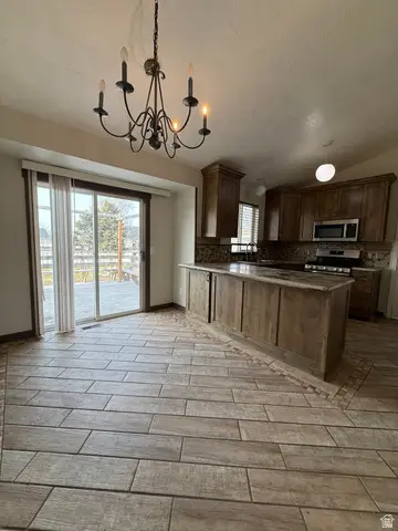 81 E Merion Dr, Stansbury Park, UT 84074 - #3