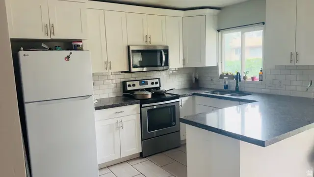 7045 W Cimmarron Dr S, West Valley City, UT 84128 - #2