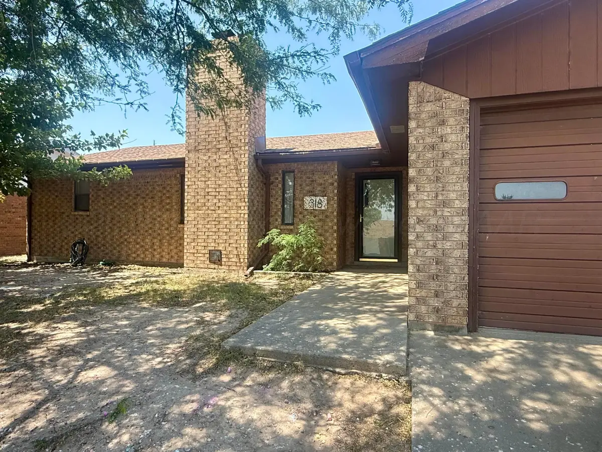 318 N Wilhelm Avenue, Stinnett, TX 79083 - #1